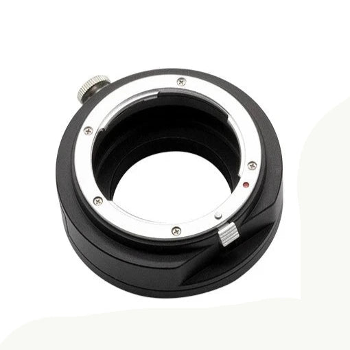 ZWO filter drawer for Nikon lens and M54M-M42F adapter on a white background